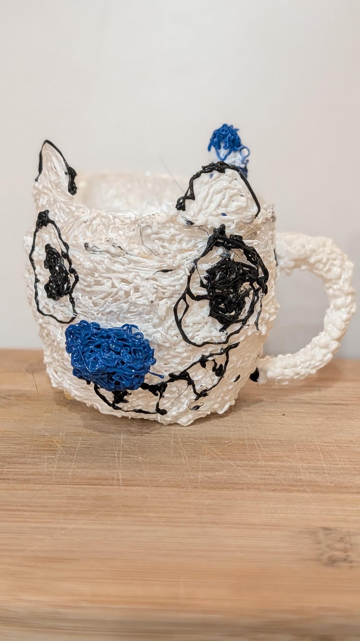 3D pen cat mug made by a student